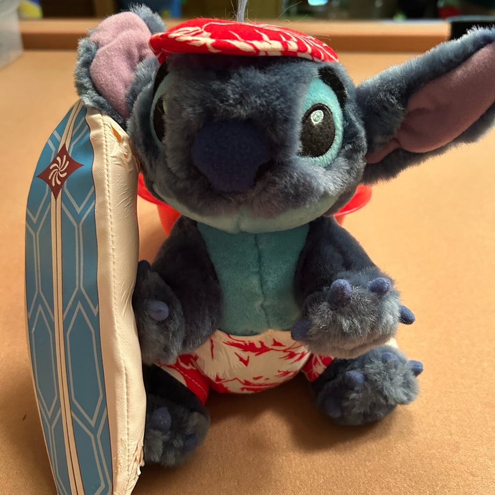 Rare Plush Disney Stitch w/surfboard
